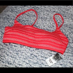 Brilliant red never worn bathing suit top